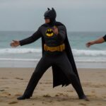 Default Leonardo DiCaprio dancing with Batman on the beach